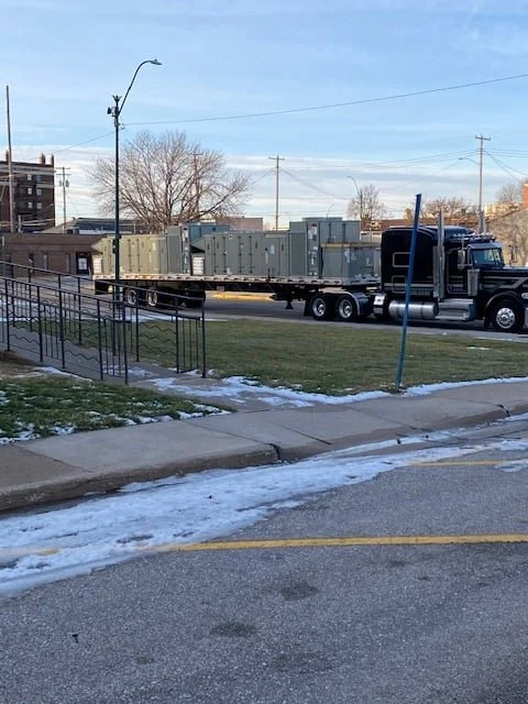 New rooftop units arriving by semi trailer at the York City Auditorium