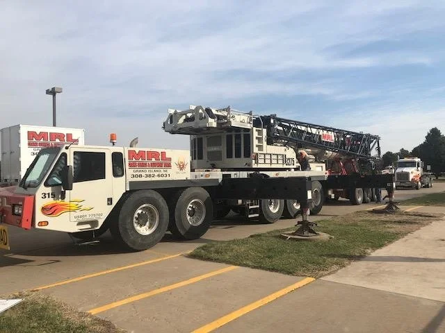 The crane staged on the street for rooftop work at York Elementary School