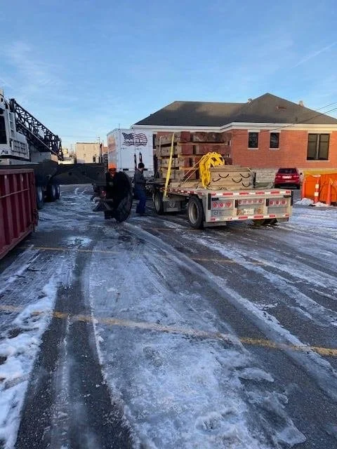 Equipment staged on a flatbed in the alley behind the York City Auditorium